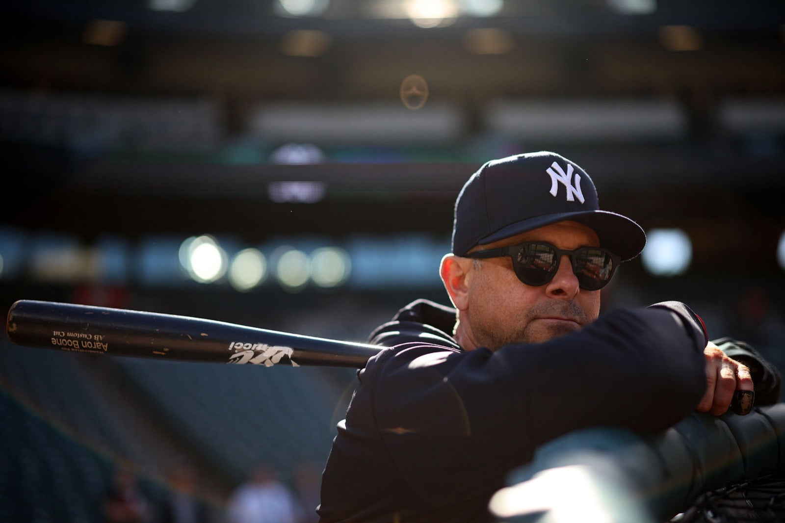 Aaron Boone in the basn5 highway 1 with Tajima polarized lenses, bat over his shoulder