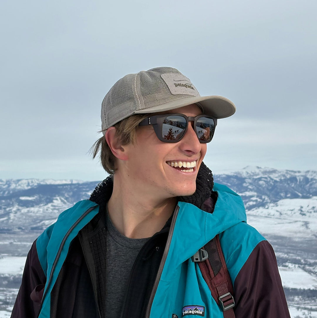 Jacob in the snow on a winter ridge, wearing basn5 Davenport