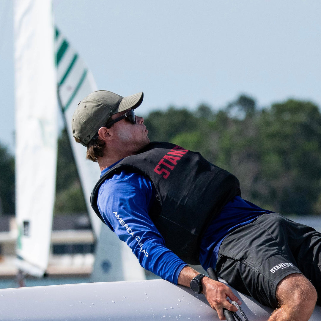Sitzmann hiking out while sailing, wearing Davenport