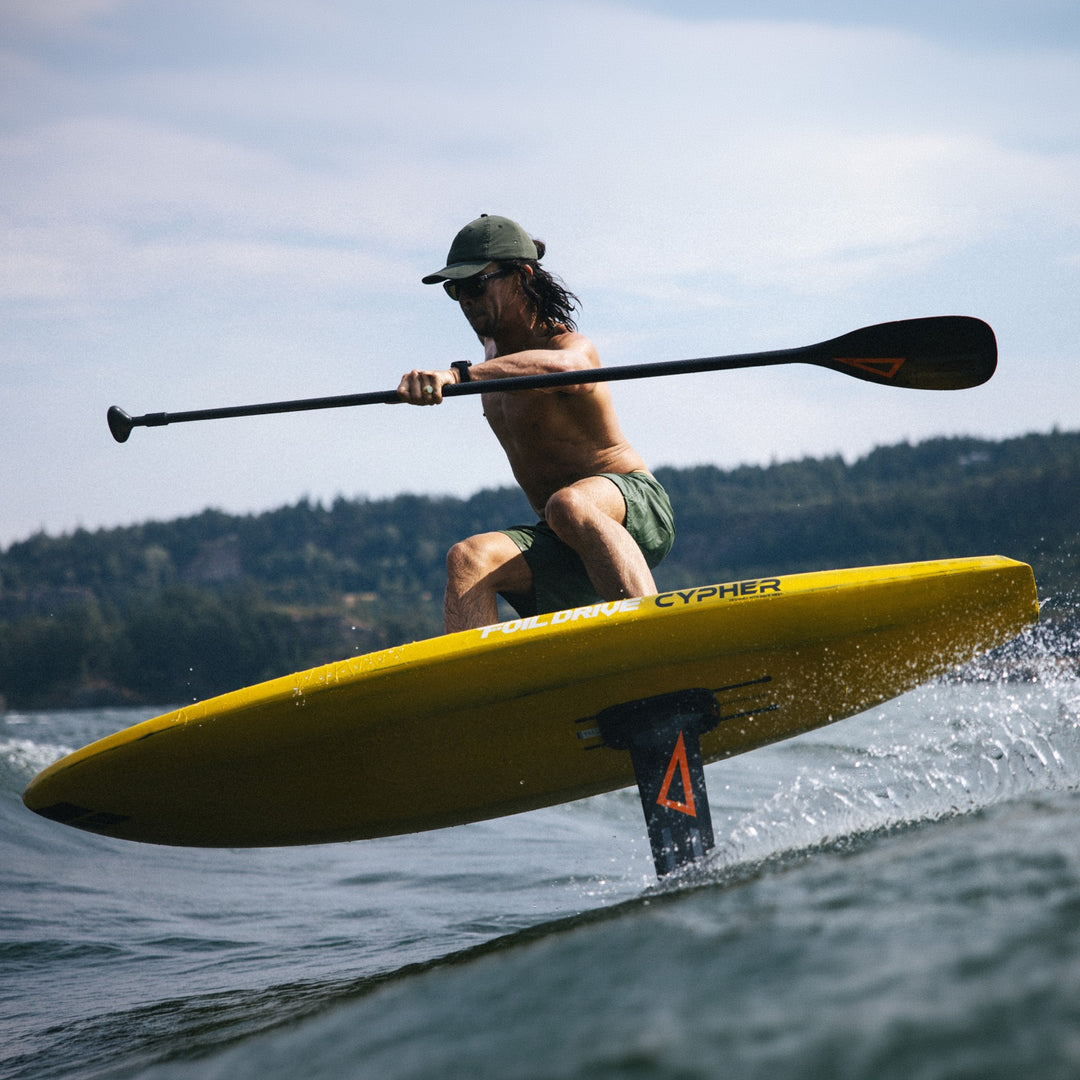 Foilboarding on yellow board, wearing basn5 Fort Point