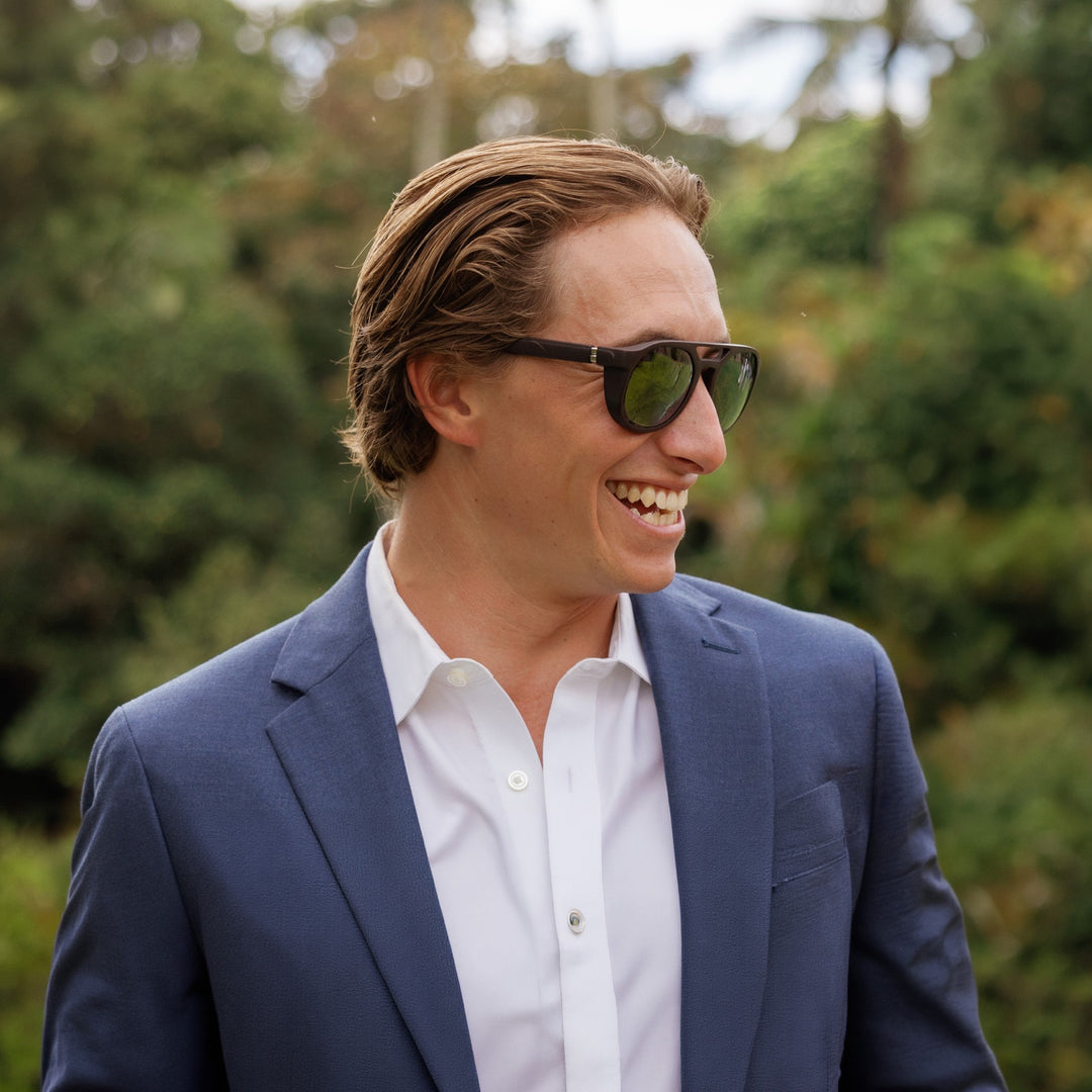 In a blazer among the trees, wearing basn5 Fort Point