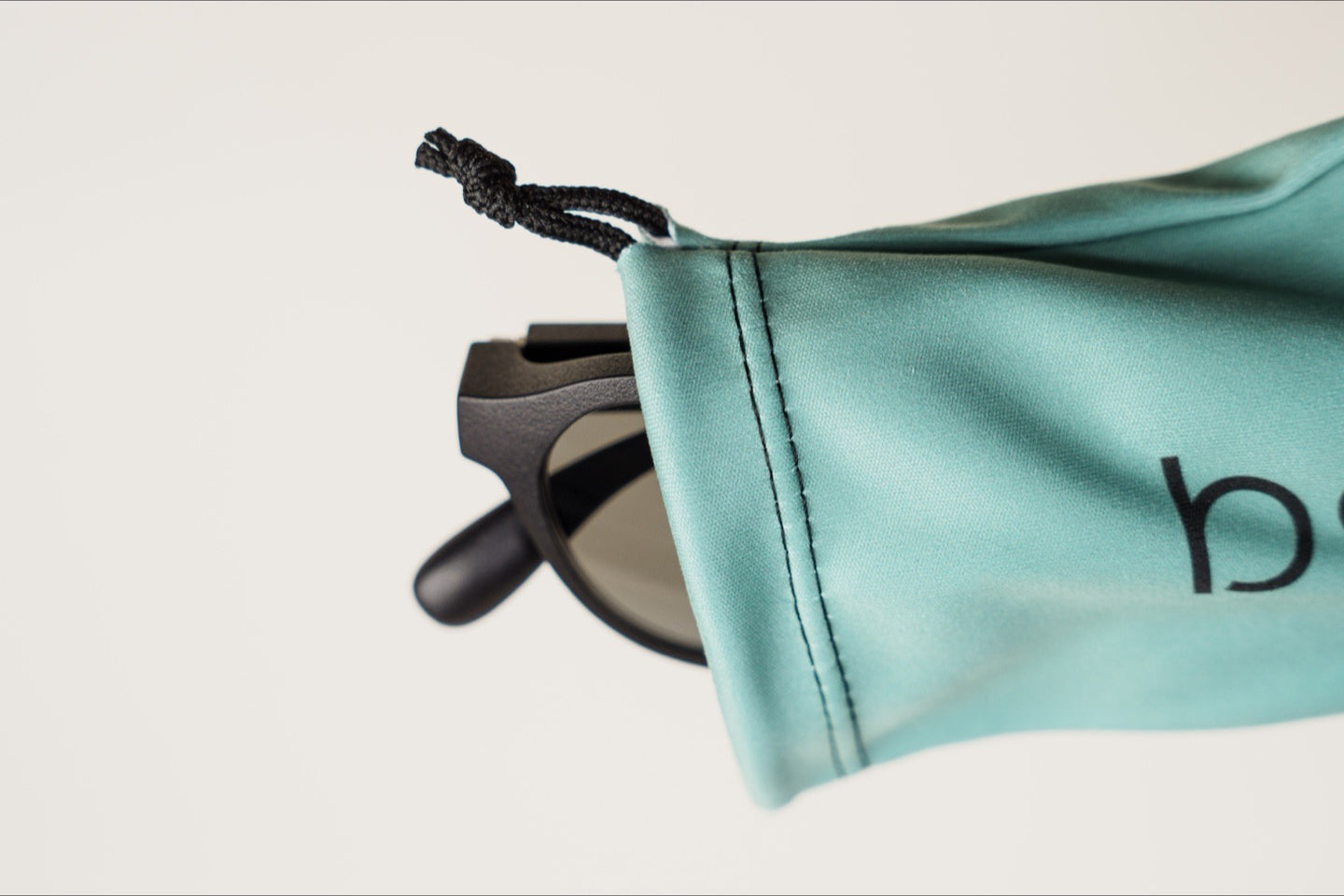 frame sliding into the microfiber pouch