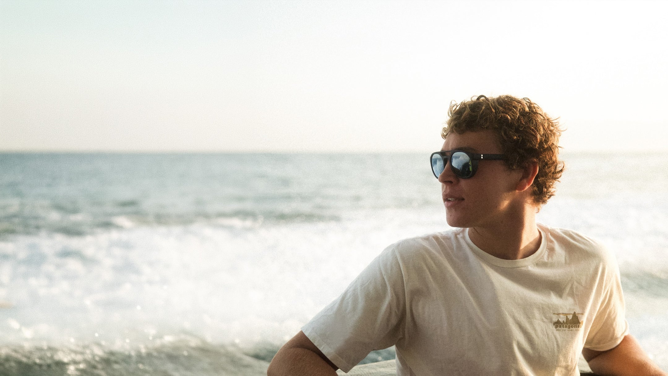 Mala'e wearing Fort Point — golden hour, ocean