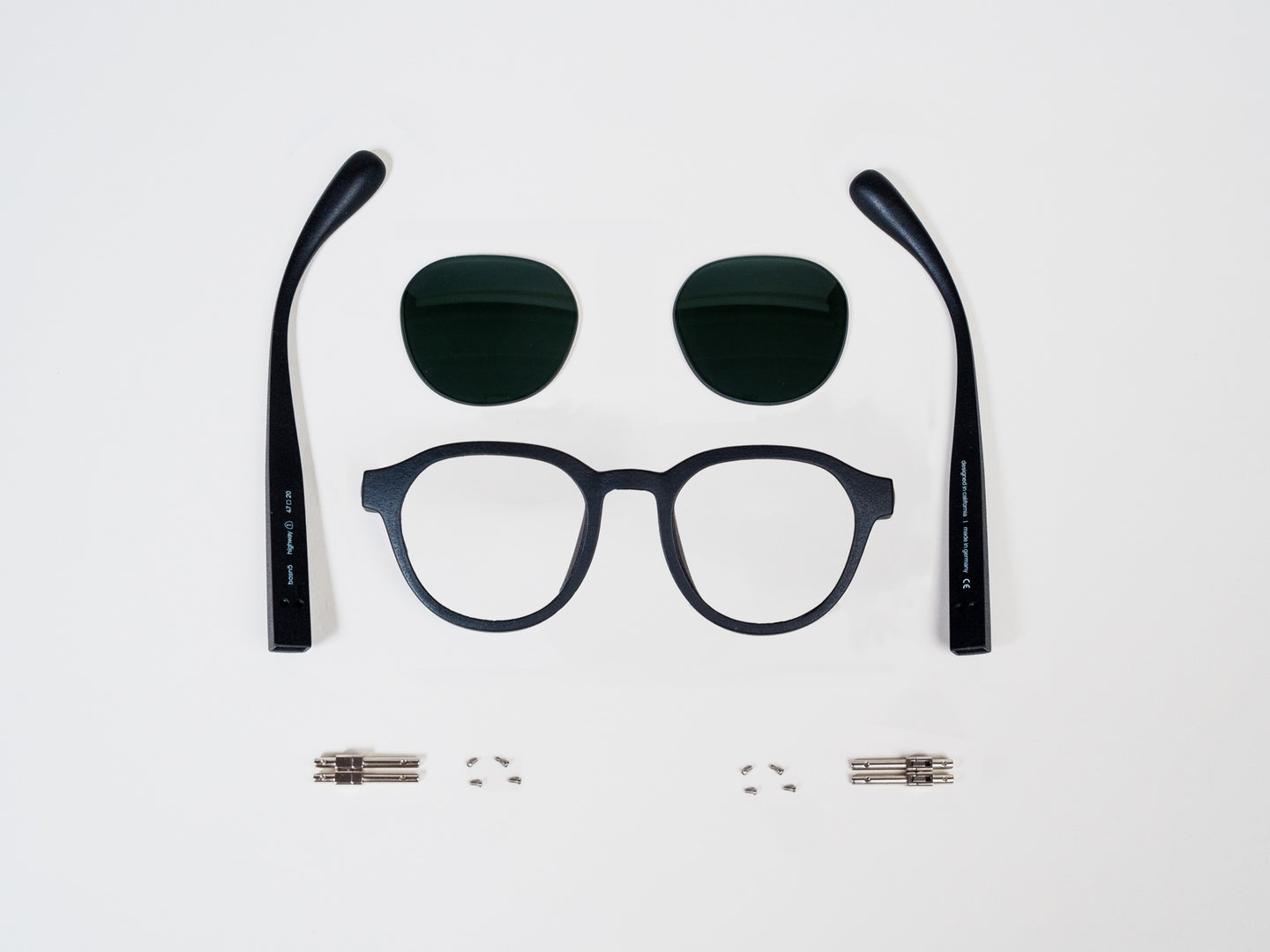 basn5 Highway 1 — frame, lenses, temples, and hinge hardware laid out flat